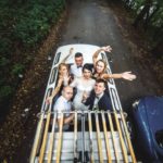 happy people car celebrating wedding 1153 2855